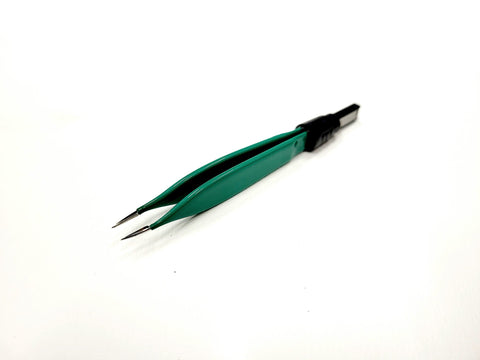 A reusable bipolar forceps with a green and black handle and metallic tips, designed for OBS-50 high frequency electrical coagulator.