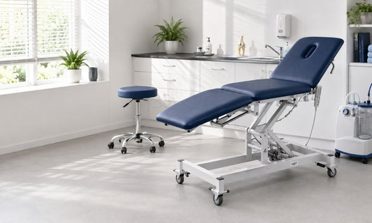Blue Treatment Couch & AED in Treatment Room