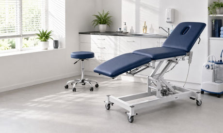 Blue Treatment Couch & AED in Treatment Room