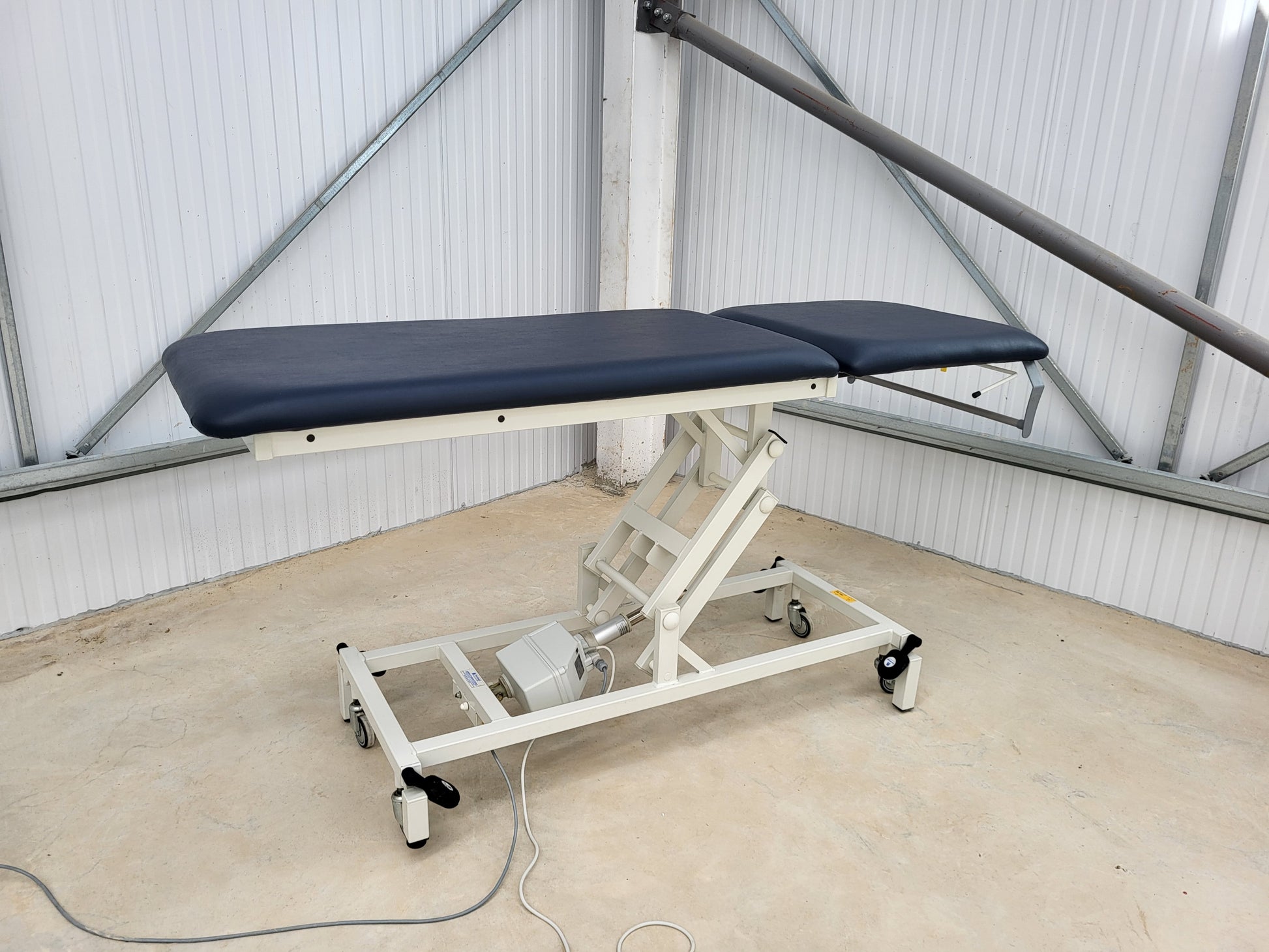 Reconditioned Two section Treatment Couch