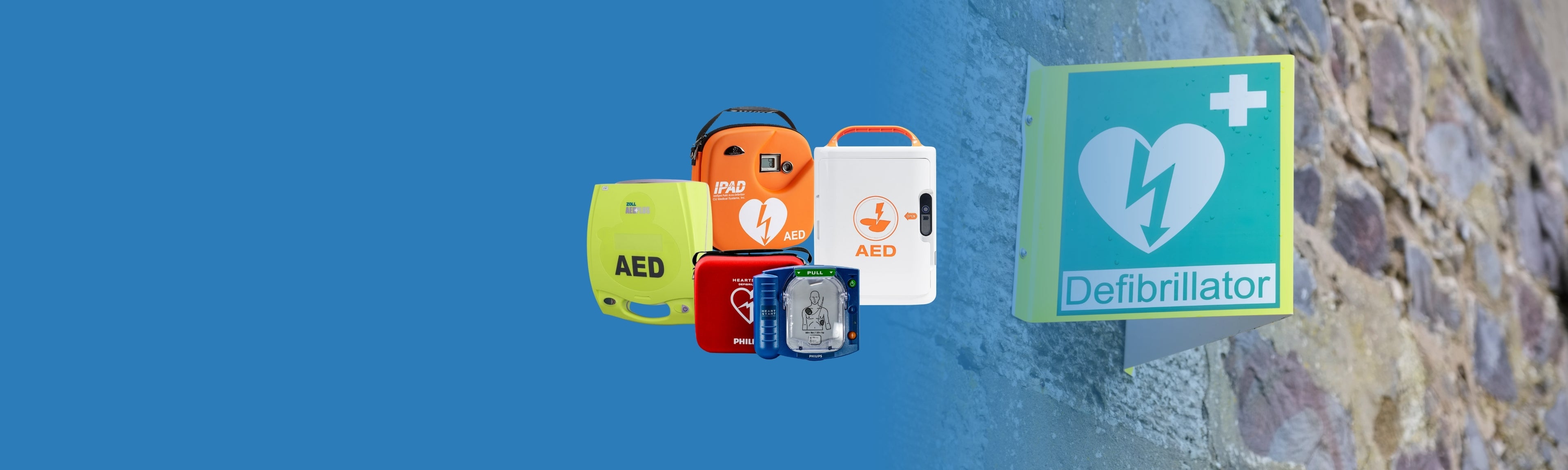Collection of AED devices on a blue background with a Defibrillator sign.