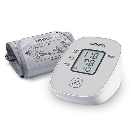 Omron M2 Digital Upper Arm Blood Pressure Monitor with a digital LCD display, showing systolic and diastolic pressures, along with a standard cuff.