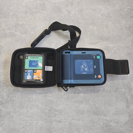 Pre-Owned Philips Heartstart FRX Defibrillator With new battery PAD s - Semi Automatic