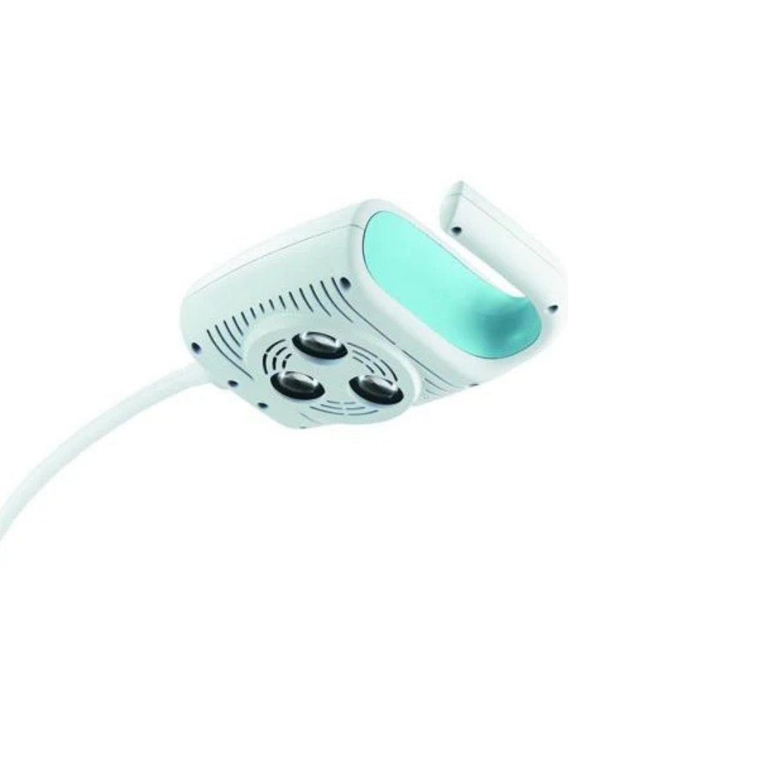 Turquoise electronic  light with a cable on a white background