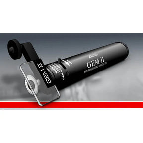 A black GEM II battery powered ring cutter kit with a finger guard unit and a battery cartridge visible.
