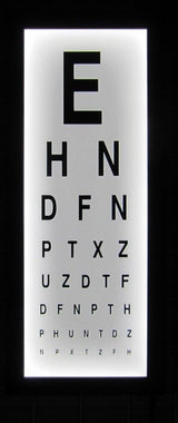 Illuminated wall-mounted eye test chart with LED lights, displaying a series of letters for vision testing.