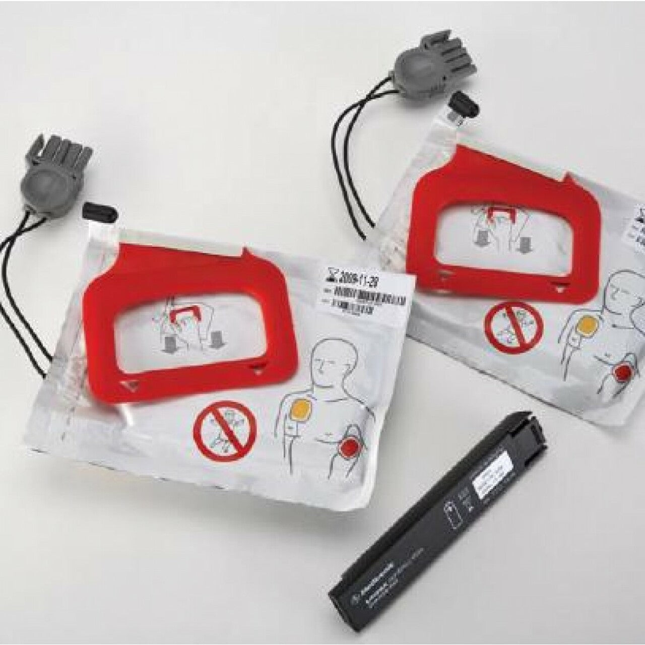 Physio Control LIFEPAK CR PLUS - CHARGE-PAK battery charger stick and 2 sets of electrode pads