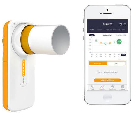 A digital peak flow meter device next to a smartphone, displaying its interface which includes test results and settings.