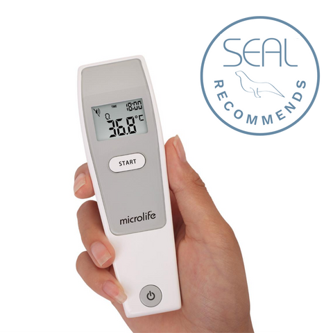 Microlife NC150 Infrared Non Touch Thermometer held in hand showing digital display with temperature reading.