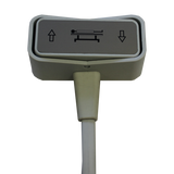 A single hand control switch for a couch, with an up-down arrow and a power symbol on the front panel.