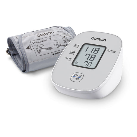 OMRON M2 Basic blood pressure monitor with a digital display and a gray arm cuff, showing the device's screen and a storage bag.