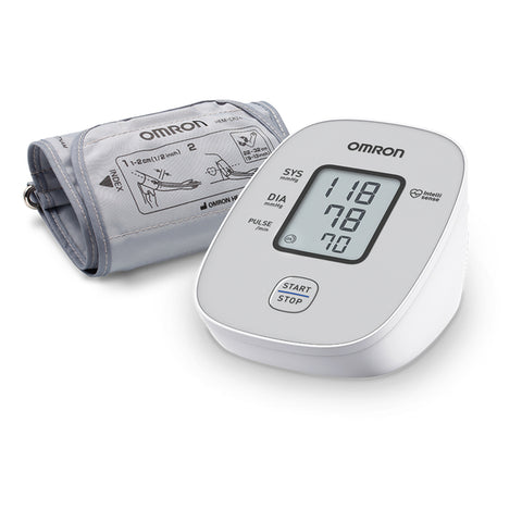 OMRON M2 Basic blood pressure monitor with a digital display and a gray arm cuff, showing the device's screen and a storage bag.